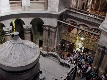 View of the edicule (tomb of Christ) and the Catholicon (Greek Orthodox cathedral) from an upper gallery.