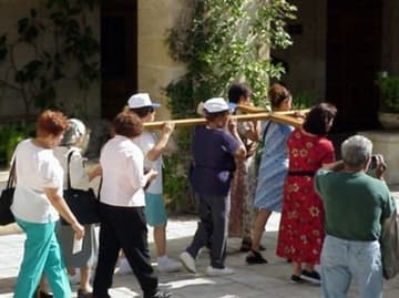 Pilgrims set out on the Via Dolorosa.