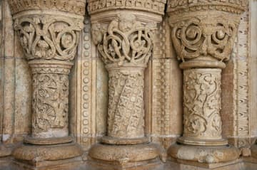 Geometric and plant-inspired decoration on the lower columns of the south portal of Bourges Cathedral, c.1160.