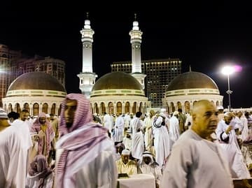 Worshippers on the mosque roof after night prayers during Ramadan.