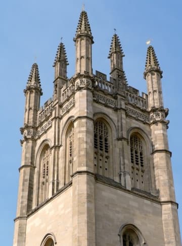 Magdalen's Perpendicular Gothic Great Tower (1492), perhaps the most beautiful in Oxford, dominates the east entrance to the city from the direction of London. Magdalen College, Oxford, England.