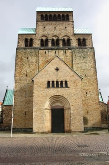 Rebuilt west tower on the 11th-century design of St. Gotthard.