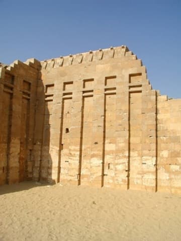 Wall with Cobra frieze.