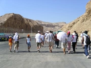 Tourists battle the heat to visit the ancient tombs.