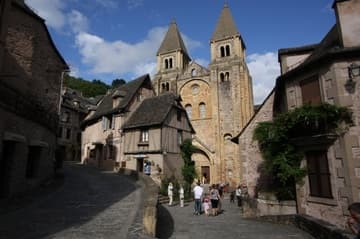 Cobbled approach to the Abbey Church of St. Foy, little changed since the Middle Ages.