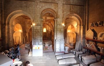 Entrance porch, with Merovingian tombs scattered about.