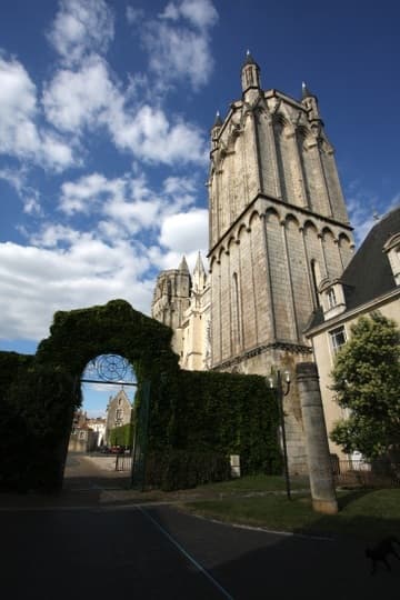 View of Poitiers Cathedral from southwest. The stout, mismatched towers are from the Transitional period of the early 13th century.