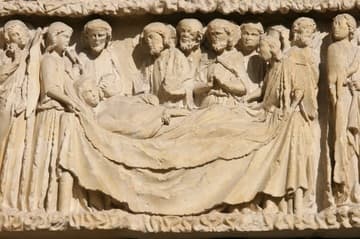 Dormition of the Virgin. Detail of left portal in the Gothic west facade of Poitiers Cathedral, dating from the late 13th century.