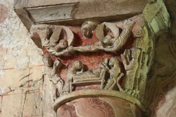 Carved capital of the death of St. Hilary in the nave.