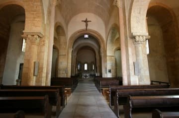 Nave looking east. 11th century. Iguerande Church, Burgundy, France.