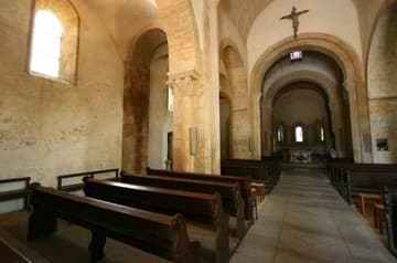Nave looking east. 11th century. Iguerande Church, Burgundy, France.