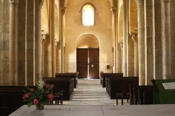Nave looking west from the altar, Iguerande Church, Burgundy, France. 11th century.