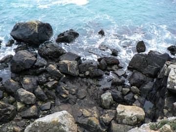 Blue waters of St. Non's Bay.