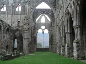 Nave of the abbey church, with east window.