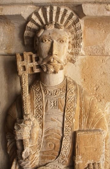 Detail of a beautiful sculpture of Saint Peter on the northeast pillar of the cloister, Aix-en-Provence Cathedral.
