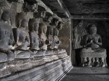 Sculptures of Buddhas in a Buddhist cave at Ellora.