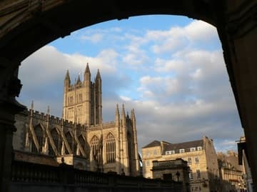 Glimpse of Bath Abbey from alongside the Roman Baths.