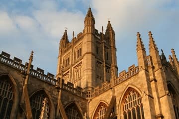The beautiful stone of Bath Abbey glows at sunset.