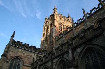 View of the Perpendicular Gothic central tower, which was inspired by the one at Gloucester Cathedral, from the northwest.