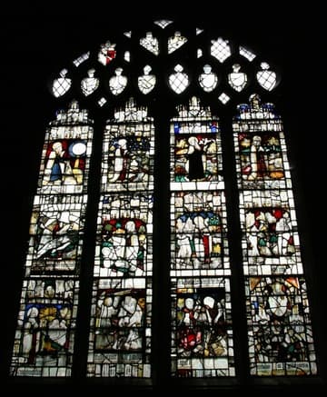 Medieval (late 1400s) stained glass window depicting Old Testament scenes. In the south wall of the south choir aisle, home to St Anne's Chapel.