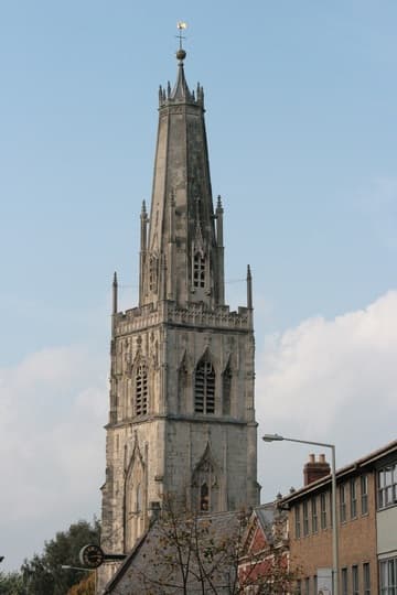 15th-century tower and truncated spire of St Nicholas' Church, seen from the east.