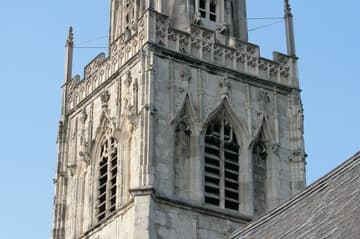 Detail of 15th-century tower and truncated spire of St Nicholas' Church, seen from the east.