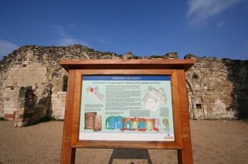 Informative sign at the site of St Oswald's Priory.
