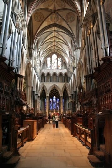 The choir, with 13th-century wooden stalls.