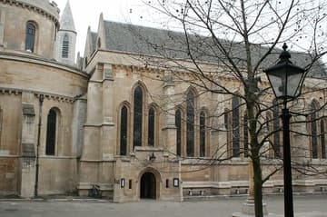 Exterior of the Temple Church in London. Built by the Knights Templar in 1185, the nave is one of only three round Norman churches remaining in England. The Gothic chancel was added in 1240 to accommodate the planned tomb of King Henry III (who ended up being buried in Westminster Abbey).