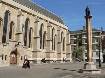 Exterior of the Temple Church in London. Built by the Knights Templar in 1185, the nave is one of only three round Norman churches remaining in England. The Gothic chancel was added in 1240 to accommodate the planned tomb of King Henry III (who ended up being buried in Westminster Abbey).