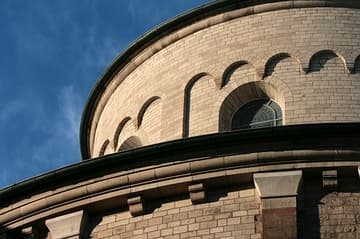 Roofline of east apse, with Lombard bands.