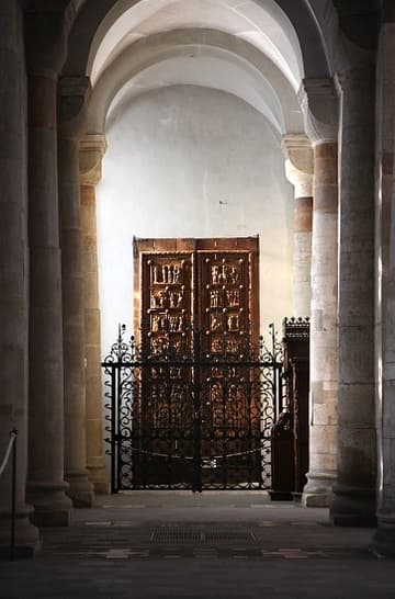 Medieval carved wooden doors, c.1065, in the south aisle.