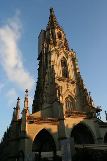 Bern's towering Münster in warm evening light.