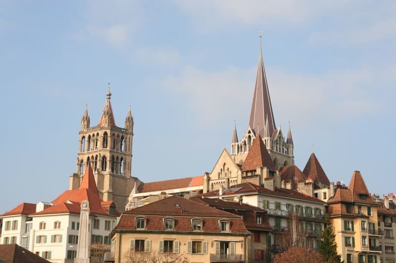 View of Lausanne Cathedral over the rooftops of the city.