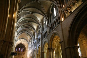 The gloriously Gothic interior of Lausanne Cathedral. The extra-large arch on the far right is part of the Great Bay, which until 1504 was an outdoor thoroughfare that connected the Rue Cite-Devant with the Rue St-Etienne under a vaulted gallery.