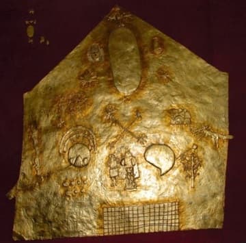 Gold plate depicting Mother Earth and the Incas.