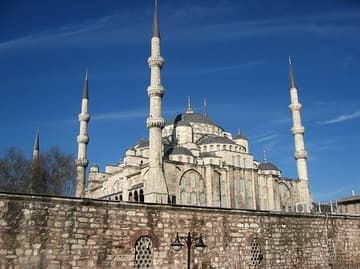 The towering Blue Mosque as seen from just outside the wall surrounding the mosque complex, on the southeast side.