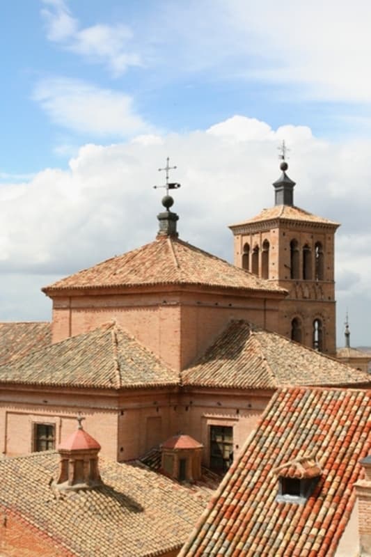 Rooftops and bell tower of Santo Tome from a neighboring tower.