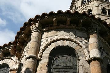 Inlaid stone decoration on the northeast chapel of the apse, 12th century. Notre-Dame-du-Port, Clermont-Ferrand, Auvergne, France.