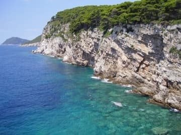 The lovely coastline of Kolocep Island at Kalamoti.