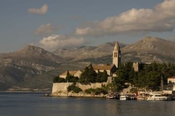 The monastery from the sea at sunset.