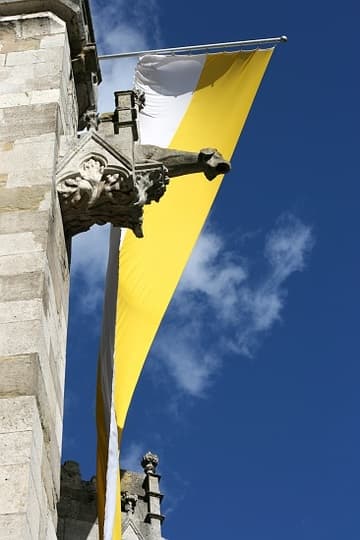 Gargoyle and bright banner on the south side.