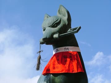 Kitsune (fox god) with key to the rice granaries.
