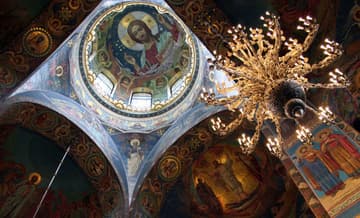Mosaics adorn pillars, ceiling and dome.
