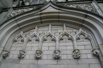 Detail of carvings near the Nieuwe Kerk's entrance.