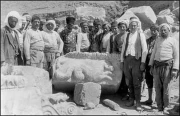The excavation crew with a monumental block from the city gate, 1924.