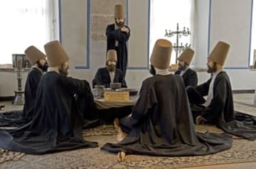 Wax figures of Sufi dervishes in the museum.