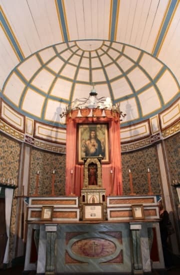 Main altar in the church of the Sacred Heart Mission near Coeur d'Alene, built 1850-53 by Jesuit missionaries and Native Americans. It is the oldest building in Idaho. Today the mission is owned by the Coeur d'Alene tribe and operated by the state as Old Mission State Park.