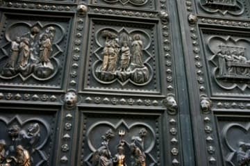 Detail of the south door, with scenes from John the Baptist's life.
