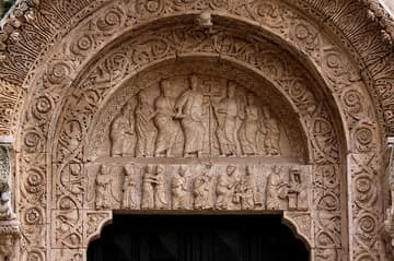 Tympanum of west portal, with 12th-century sculptures.
